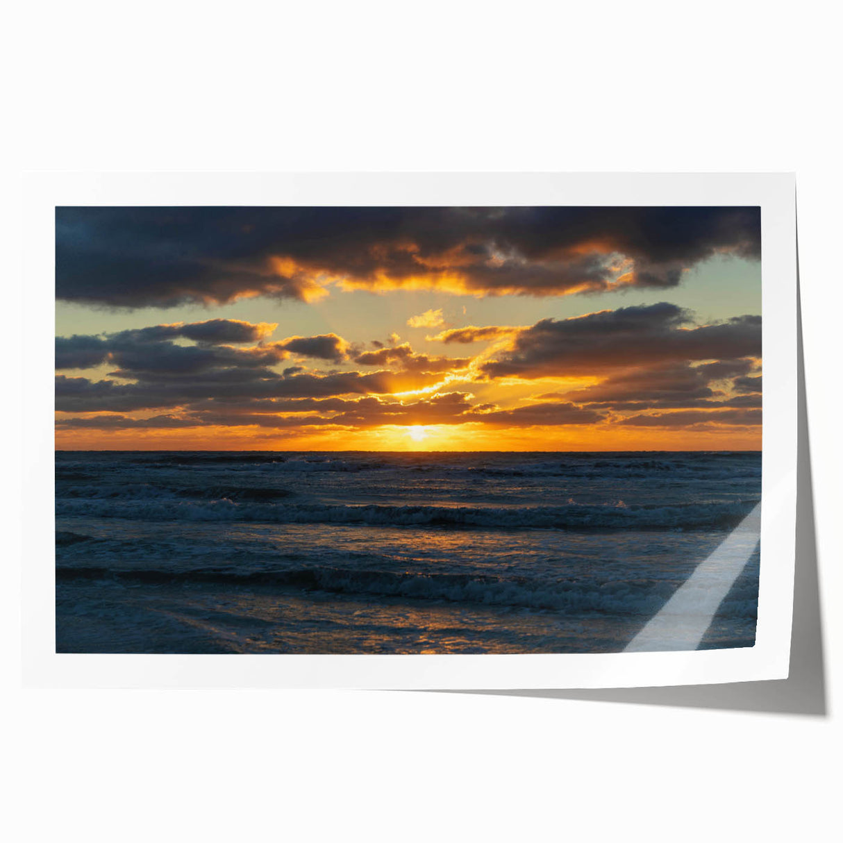 Vibrant rolled print showcasing a serene landscape with a colorful sky, ideal for home decor, featuring rich hues and intricate details in a sturdy cardboard tube.