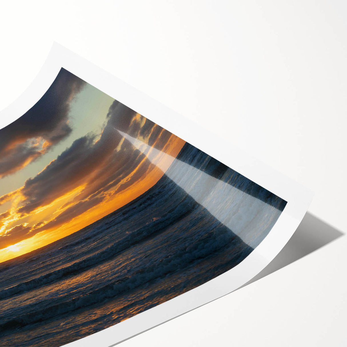 Vibrant rolled print of a landscape featuring a serene sunset over mountains, showcasing rich hues of orange and purple, ideal for home decor. Perfect for nature lovers and art enthusiasts.