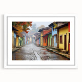 Framed wall art showcasing a vibrant city landscape with colorful streets and buildings, elegantly matted in white, perfect for modern home decor.