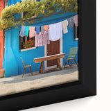 Framed canvas wall art featuring a vibrant cityscape design with intricate details and bold colors, showcasing urban life in a contemporary style.