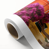 Rolled canvas artwork showcasing a vibrant street landscape design, featuring colorful buildings and dynamic city life, perfect for modern decor enthusiasts.