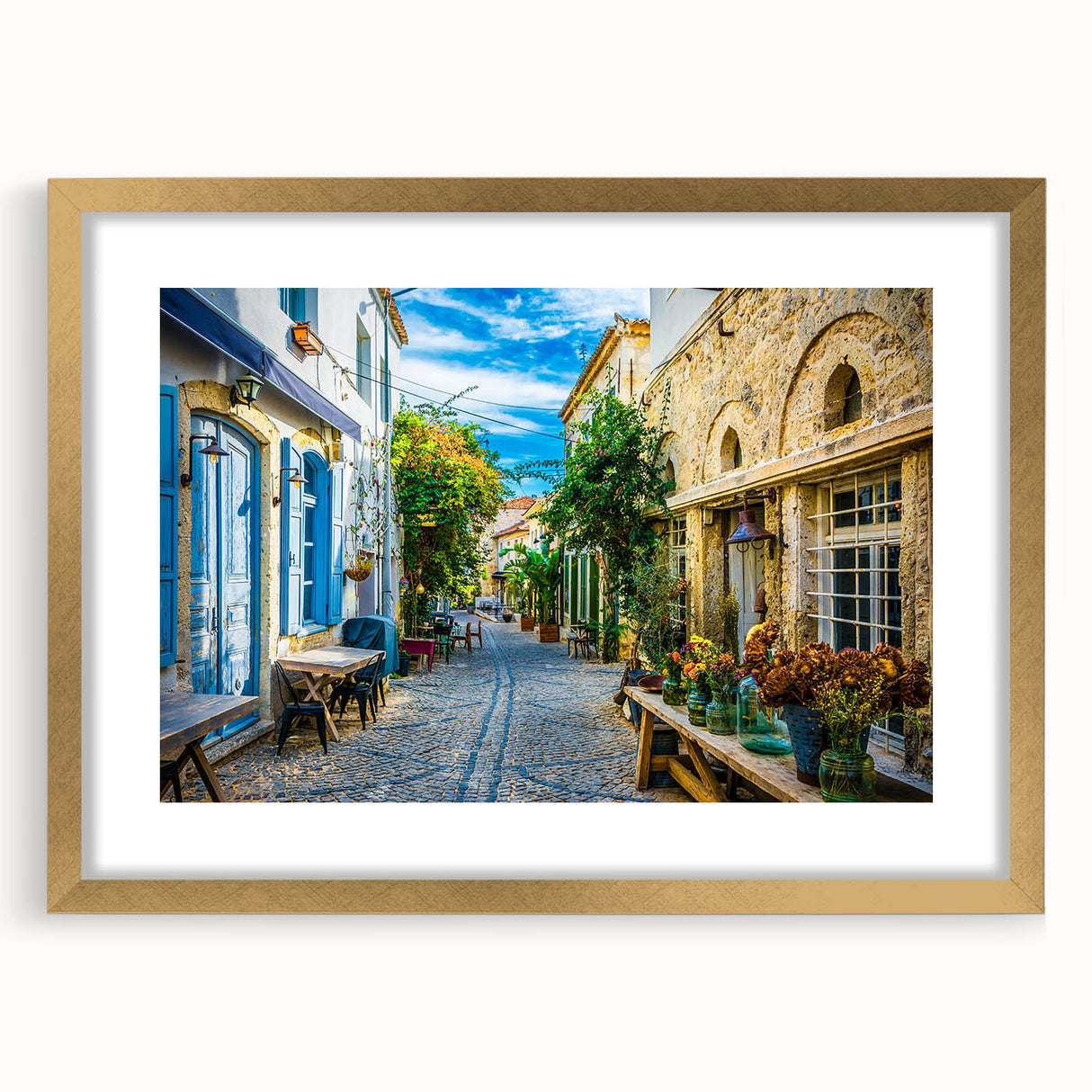 Gold-framed wall art featuring a vibrant landscape design, displayed with a mat, showcasing intricate details and rich colors, perfect for home decor enhancement.