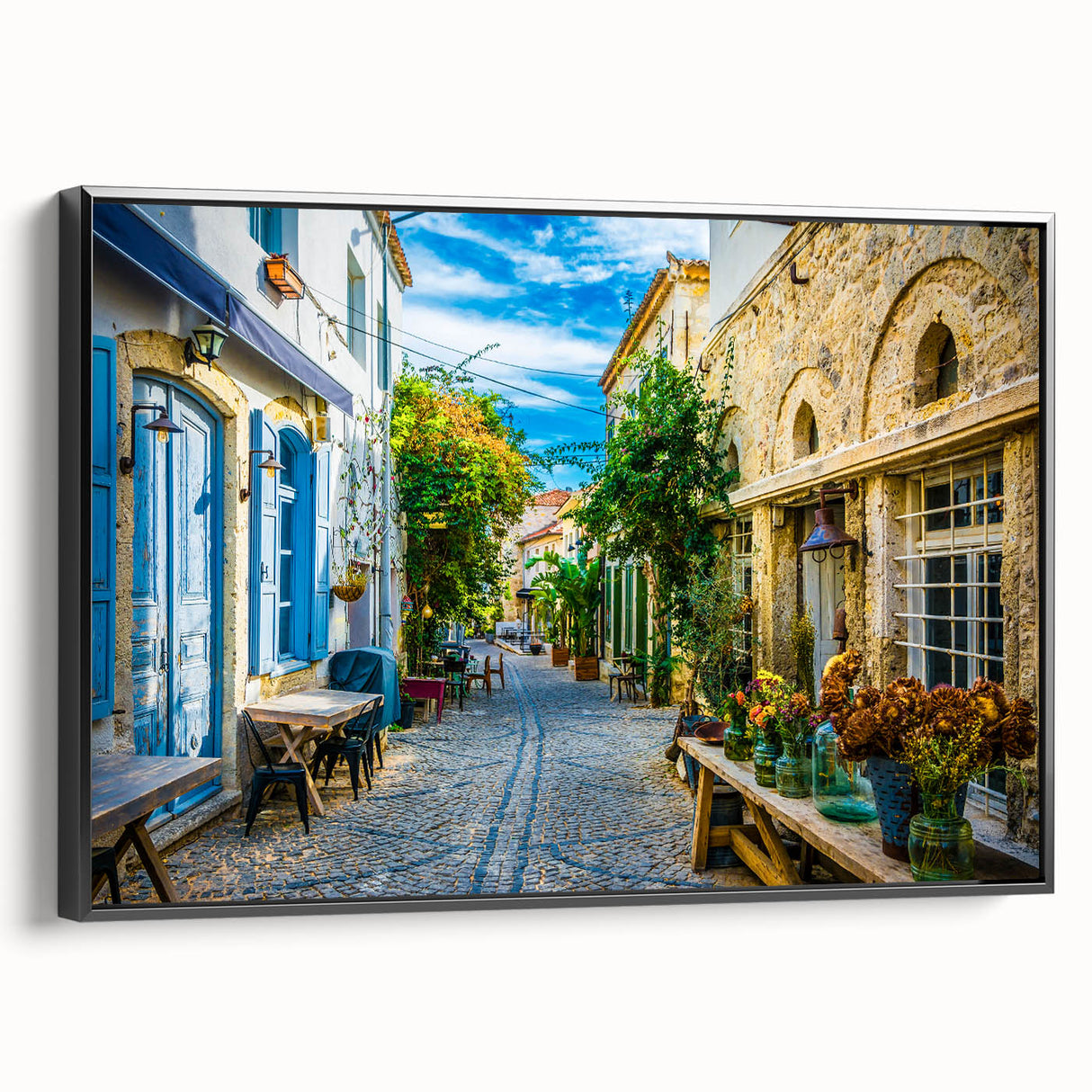 Framed canvas wall art featuring a modern landscape design in muted colors, showcasing a serene street scene, viewed from the side with a black frame. Ideal for home decor.