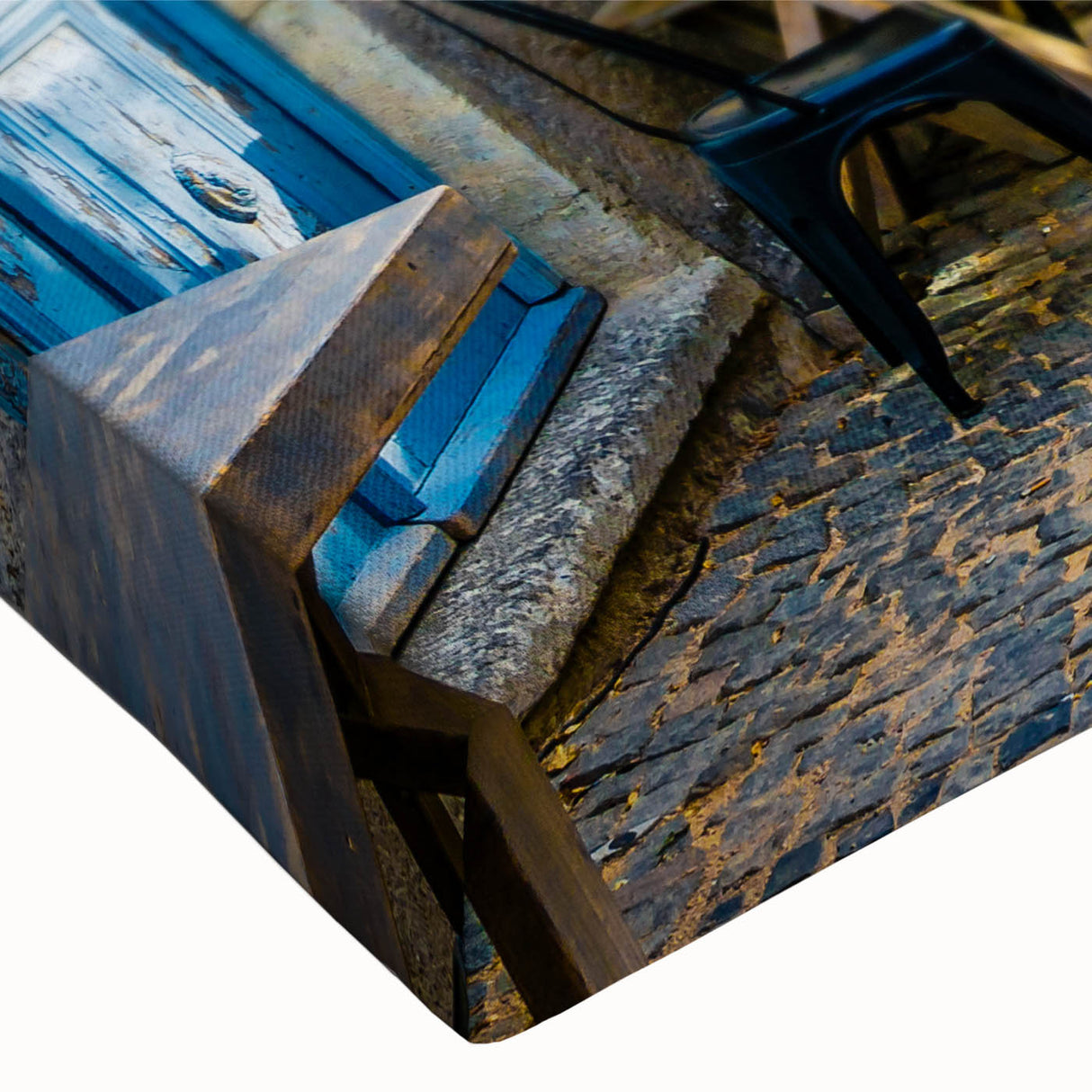 Close-up of a colorful stretched canvas wall art piece showcasing an abstract landscape design, featuring vibrant hues of blue and orange, perfect for modern home decor.