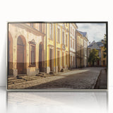 Framed acrylic wall art showcasing a modern cityscape design, featuring sleek silver accents and vibrant colors, perfect for contemporary home decor.