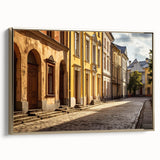 Framed canvas wall art featuring a vibrant city street landscape design, accented with gold trim, ideal for modern home decor. Perfect for adding a stylish touch to living spaces.