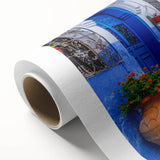 Rolled canvas artwork showcasing a vibrant street landscape design, featuring rich colors and intricate details, ideal for modern home decor and art enthusiasts.