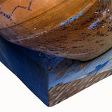 Close-up of a vibrant stretched canvas wall art piece showcasing a colorful abstract landscape design, perfect for modern home decor and interior styling.