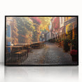 Framed acrylic wall art featuring a vibrant cityscape design, showcasing colorful streets and buildings, presented with a sleek black frame for modern decor.