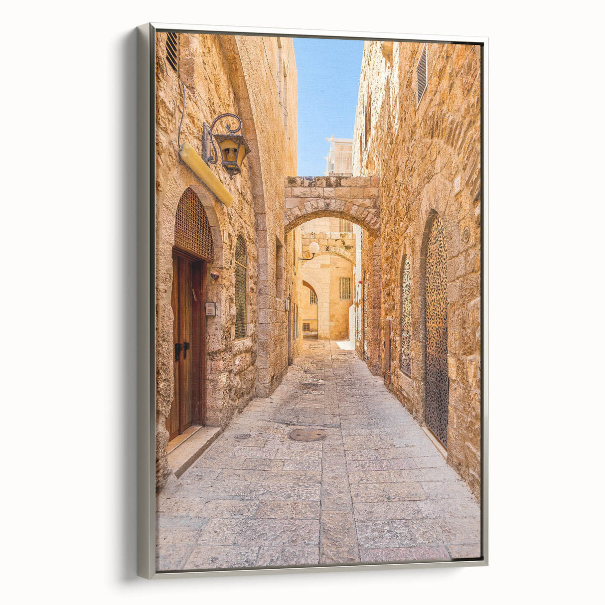 Framed wall art canvas featuring a modern landscape design with vibrant colors and intricate details, accented with a sleek silver frame for a stylish touch.