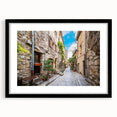 Framed wall art collection featuring a minimalist black frame with a mat, showcasing a vibrant landscape design, ideal for modern home decor.
