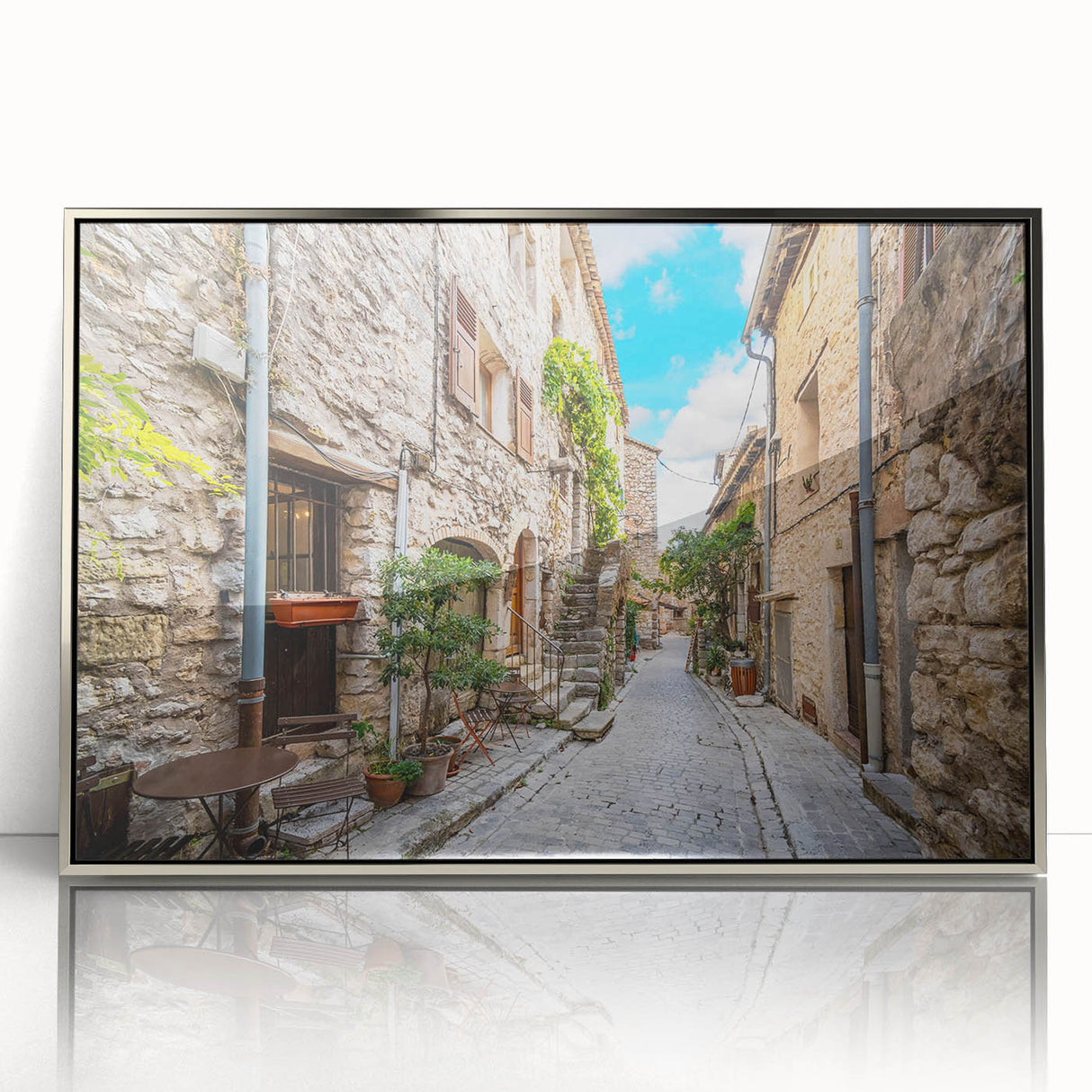 Framed acrylic wall art featuring a vibrant streetscape design with silver accents, ideal for modern home decor. Perfect for enhancing living spaces with artistic flair.