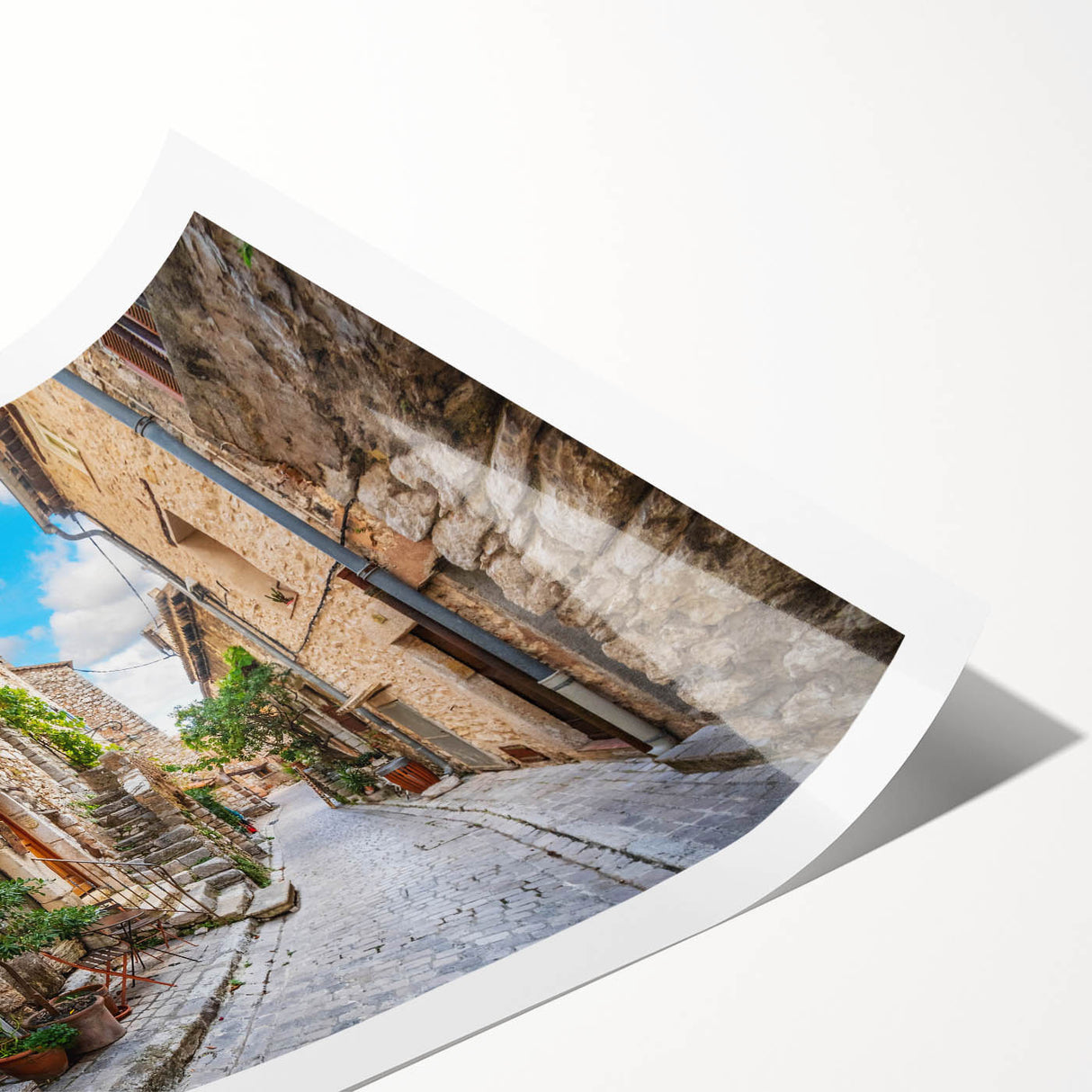 Rolled print of a vibrant landscape street design wall art, showcasing colorful urban scenery with intricate details, packaged securely in a protective tube.