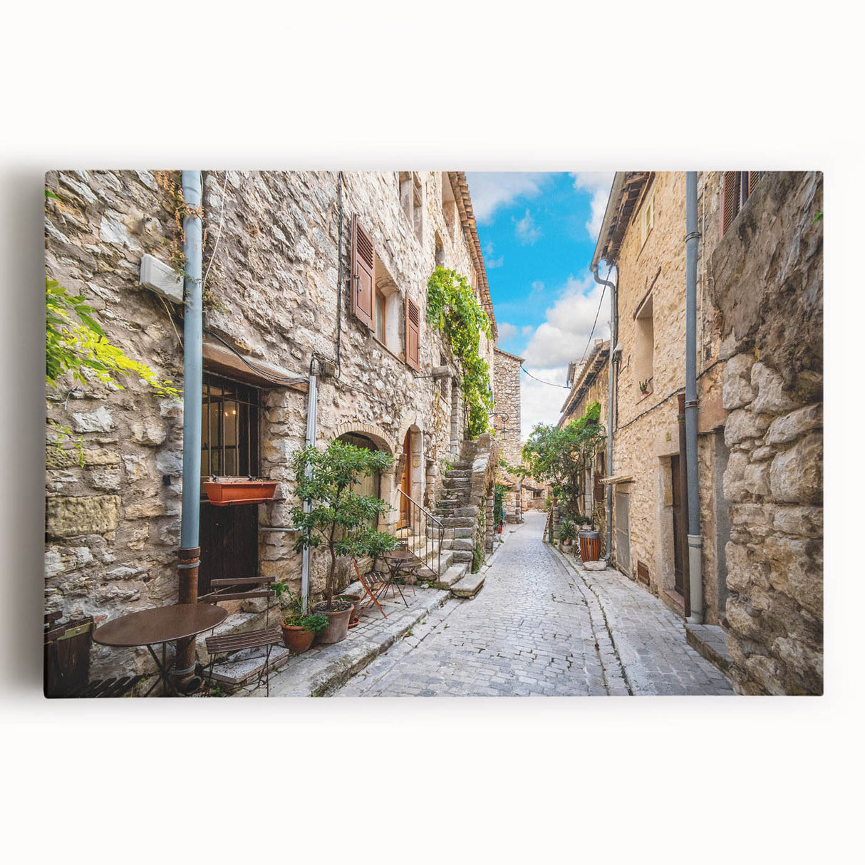 Stretched canvas wall art showcasing a vibrant urban landscape design, featuring colorful streets and buildings, perfect for modern home decor. This piece enhances interior spaces with its lively aesthetic and artistic flair.