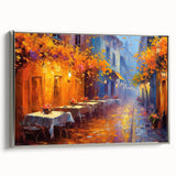 Framed canvas wall art depicting a serene landscape with vibrant colors, showcasing streets and nature, elegantly bordered in silver for a sophisticated touch.