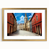 Framed wall art collection showcasing a vibrant landscape street design, featuring a gold frame and mat, ideal for modern home decor and artistic interiors.