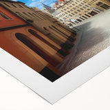 Vibrant rolled canvas artwork showcasing a contemporary street landscape design, featuring vivid colors and intricate details, packaged securely for delivery.