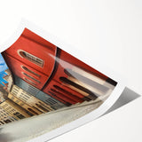 Rolled print showcasing a vibrant street landscape design featuring colorful buildings and urban elements, perfect for modern home decor and wall art collections.