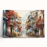 Stretched canvas wall art showcasing a vibrant cityscape design with abstract colors and geometric shapes, leaning against a neutral wall, ideal for modern home decor.