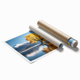 Rolled print showcasing a vibrant landscape design with lush green trees and a serene sky, perfect for enhancing interior decor in homes or offices.