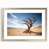 Framed wall art showcasing a serene landscape with trees, featuring a silver mat and frame, perfect for home decor and enhancing interior aesthetics.