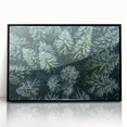 Framed wall art featuring a vibrant landscape design with trees, presented in a sleek black frame, showcasing a modern aesthetic for home decor enthusiasts.