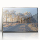Framed wall art featuring a serene landscape with vibrant green trees and a calming blue sky, designed for modern home decor. The sleek silver frame adds elegance, making it a perfect addition to any living space.
