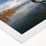 Rolled canvas showcasing a vibrant landscape design with lush green trees and a serene blue sky, ideal for adding a natural touch to home decor.