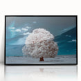 Framed wall art featuring a vibrant landscape design with trees, showcased in a sleek black frame, perfect for enhancing home decor and adding a touch of nature.