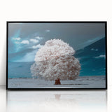 Framed wall art featuring a vibrant landscape design with trees, showcased in a sleek black frame, perfect for enhancing home decor and adding a touch of nature.