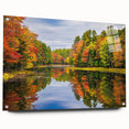 Side view of a modern wall art collection featuring acrylic glass landscapes and tree designs, elegantly displayed with pins on a wooden wall, perfect for enhancing contemporary decor.