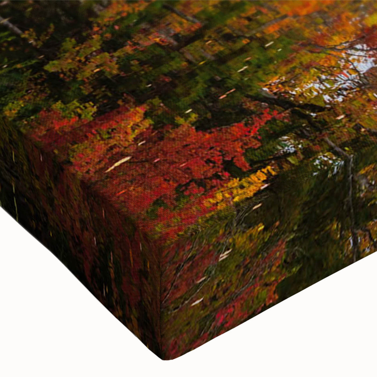 Close-up of a stretched canvas artwork showcasing a vibrant landscape with lush green trees and a serene blue sky, perfect for nature-inspired decor.