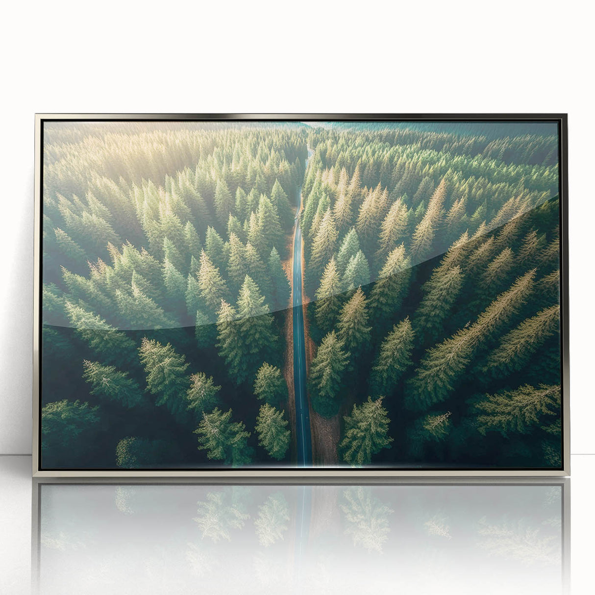 Framed acrylic wall art showcasing a serene landscape with lush green trees, presented in a sleek silver frame, ideal for modern home décor.