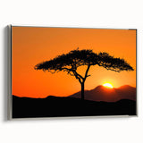 Framed canvas wall art collection showcasing a serene landscape with lush green trees and a silver frame, ideal for enhancing home decor and creating a calming atmosphere.