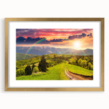 Framed wall art showcasing a serene valley landscape in gold matting, perfect for home decor, emphasizing nature's tranquility and elegance.