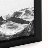 Close-up of a framed canvas artwork showcasing a vibrant landscape with rolling valleys and lush greenery, ideal for modern home decor and art enthusiasts.