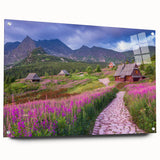 Acrylic glass wall art featuring a vibrant landscape design of a serene valley, showcasing rich greens and blues, framed with decorative pins for an elegant display.