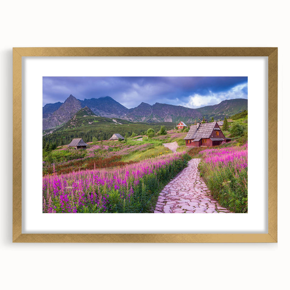 Framed wall art of a scenic valley landscape, showcasing vibrant colors and intricate details, with a gold mat and frame, perfect for home decor.