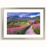Framed wall art of a serene valley landscape design, featuring a silver mat, showcasing lush greenery and rolling hills, perfect for home decor.