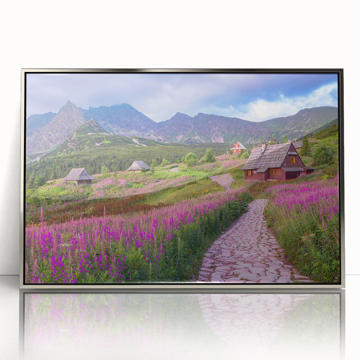 Framed wall art piece showcasing a serene valley landscape in silver-acrylic finish, ideal for modern home decor, adding elegance to any room setting.