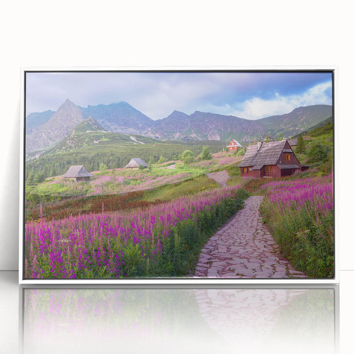 Framed wall art collection showcasing a serene valley landscape design with vibrant colors, set in a sleek white frame, ideal for home decor enhancement.