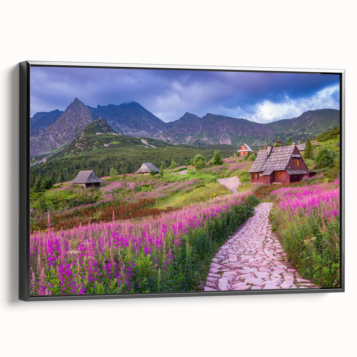 Framed canvas wall art showcasing a serene valley landscape design with vibrant colors and rich textures, viewed from the side against a neutral backdrop.