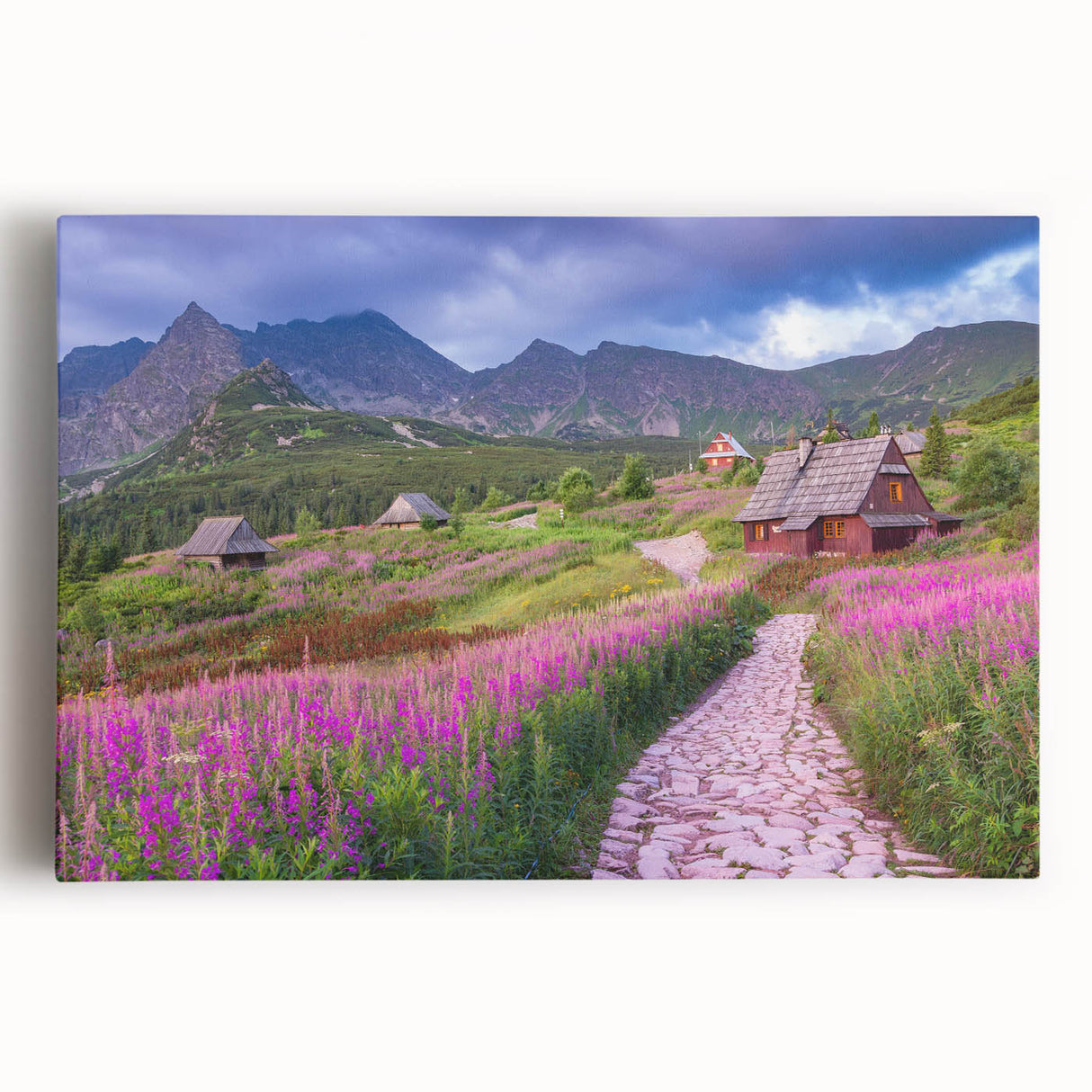 Stretched canvas wall art depicting a serene valley landscape with vibrant green hills and a clear blue sky, perfect for adding tranquility to any room decor.