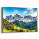 Framed canvas wall art depicting a serene landscape valley, featuring lush greenery and a vibrant sunset, accented by a gold frame for an elegant touch.
