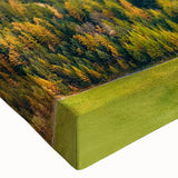 Close-up of a vibrant stretched canvas wall art featuring a serene valley landscape design, showcasing rich greens and blues, perfect for home decor.