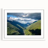 Framed landscape wall art collection featuring a serene valley design in soft earth tones, set against a white mat, enhancing any modern decor.