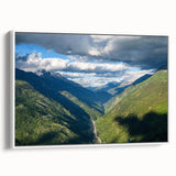 Framed canvas wall art showcasing a serene valley landscape in soft greens and blues, perfect for enhancing home decor with a calming nature theme.