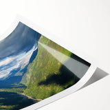 Vibrant rolled print showcasing a serene valley landscape with lush greenery and rolling hills, ideal for home decor in a modern setting. Perfect for nature enthusiasts.