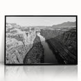 Framed acrylic wall art showcasing a serene valley landscape with rich green hues and dramatic mountain silhouettes, ideal for enhancing home decor aesthetics.
