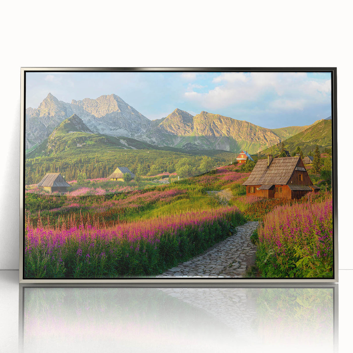 Framed wall art featuring a stunning valley landscape design in a silver-accented frame, showcasing vibrant colors and intricate details, perfect for home decor.
